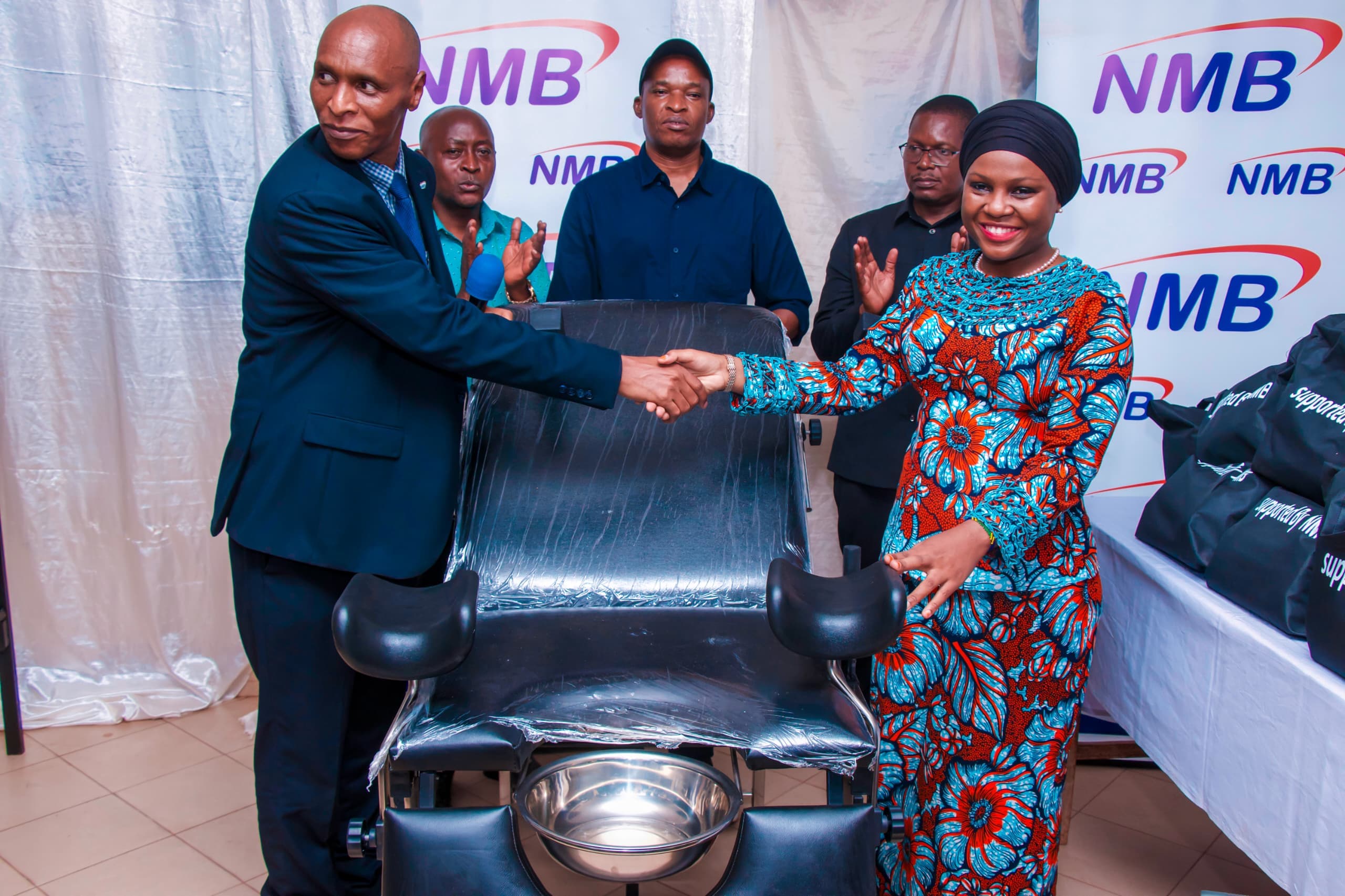 NMB YAKABIDHI VIFAA VYA MILIONI.42.4 KIGOMA,WADAU WAHIMIZWA KUUNGA MKONO SERIKALI